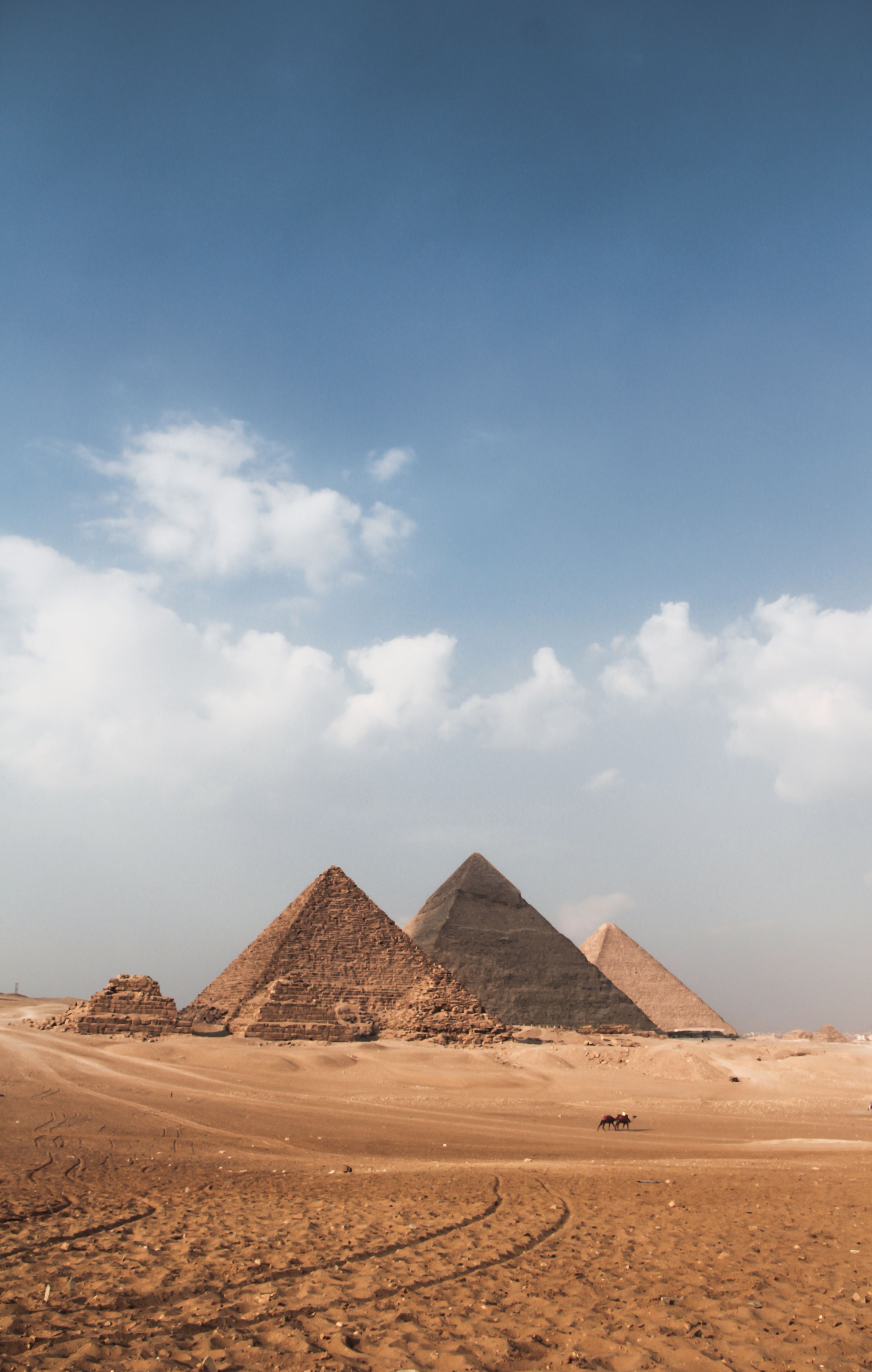 The Giza Pyramids in daylight, near the Grand Egyptian Museum