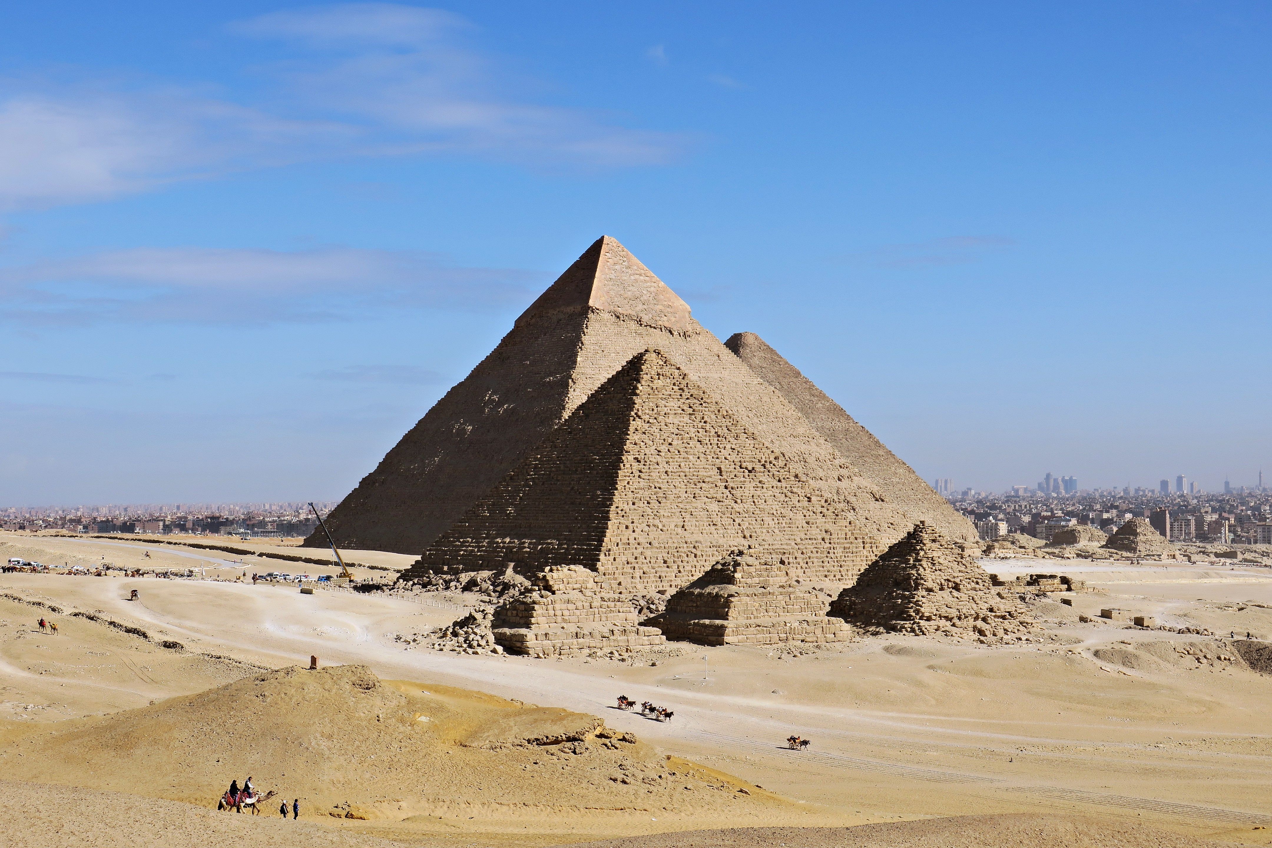 The Great Pyramid of Giza with the Cairo skyline behind